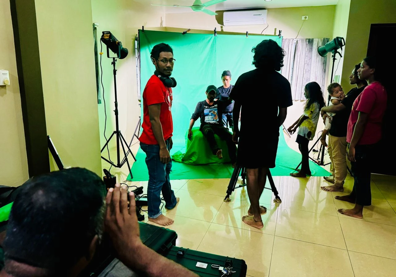 Crew filming a green-screen production